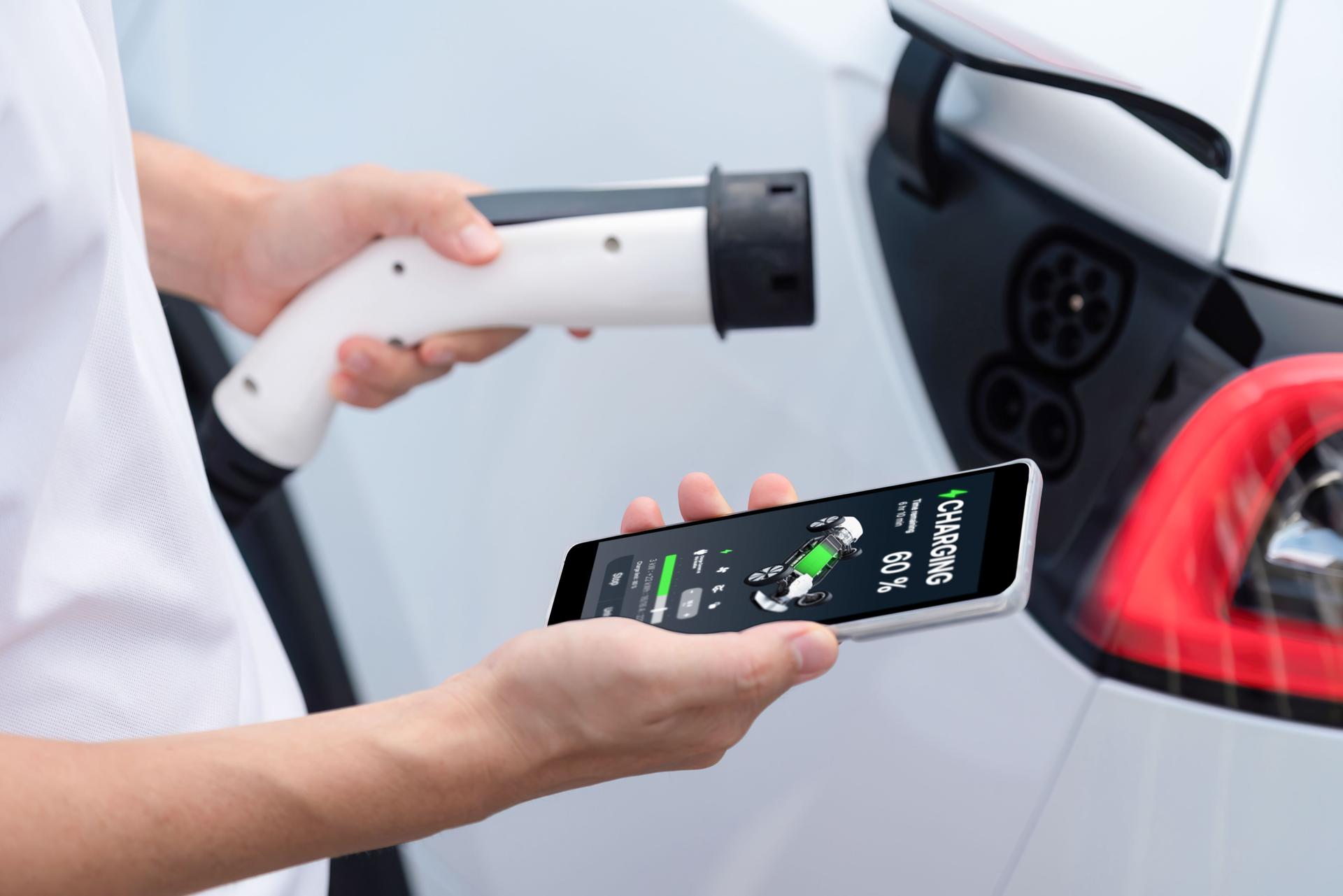 Ev car battery status display on smartphone application. Perpetual