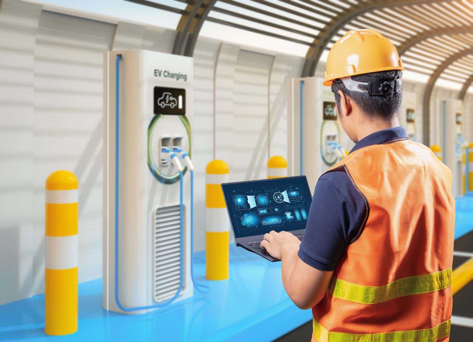 Engineer or technician with EV charging stations